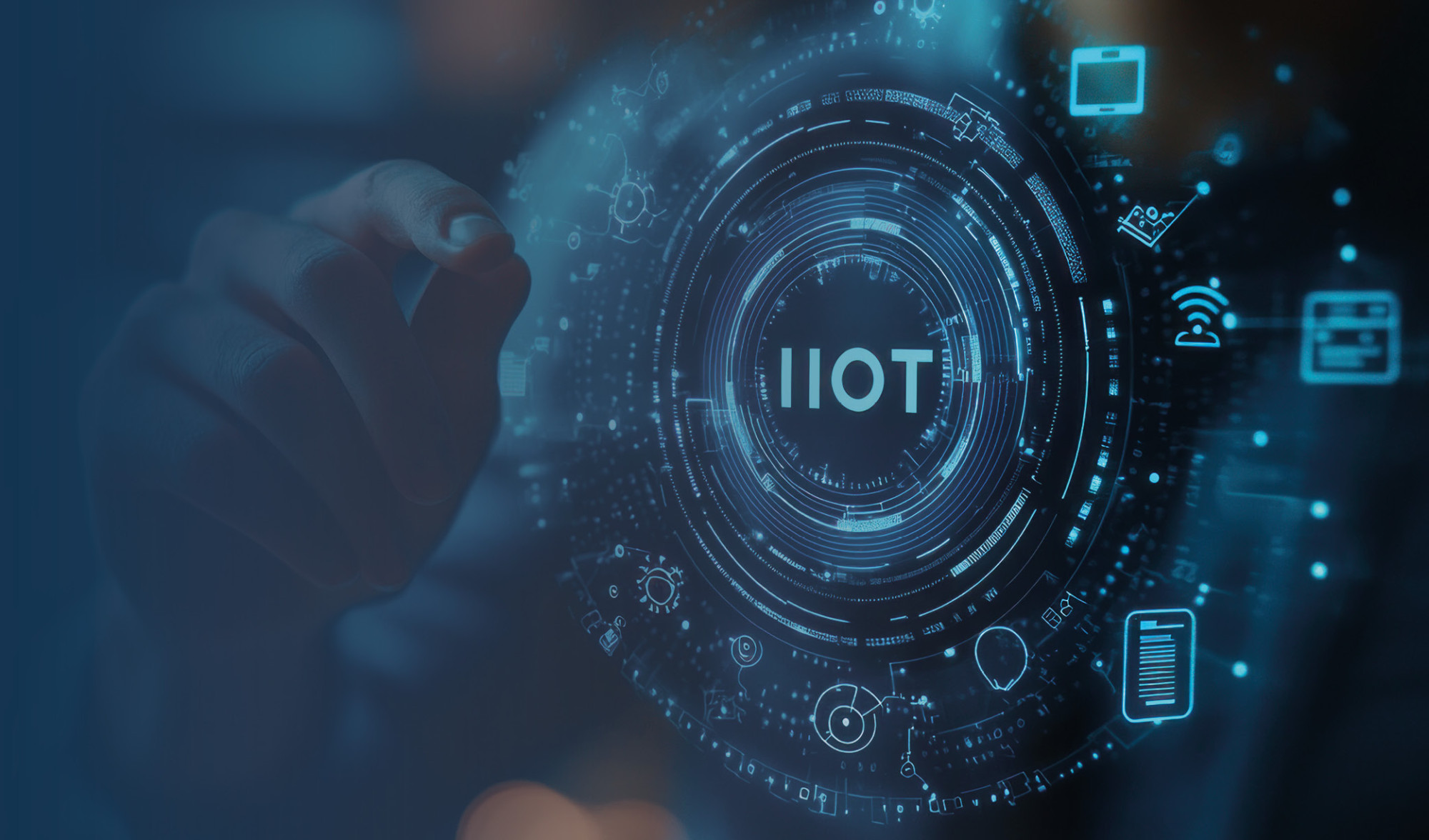 A hand reaching out to touch a digital interface displaying "IIOT" surrounded by various technology icons and data patterns.