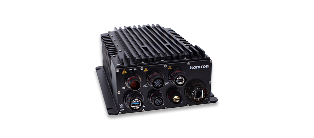A rugged electronic device with multiple ports and connectors, featuring a heat sink on top. The device is branded with the name "Kontron."